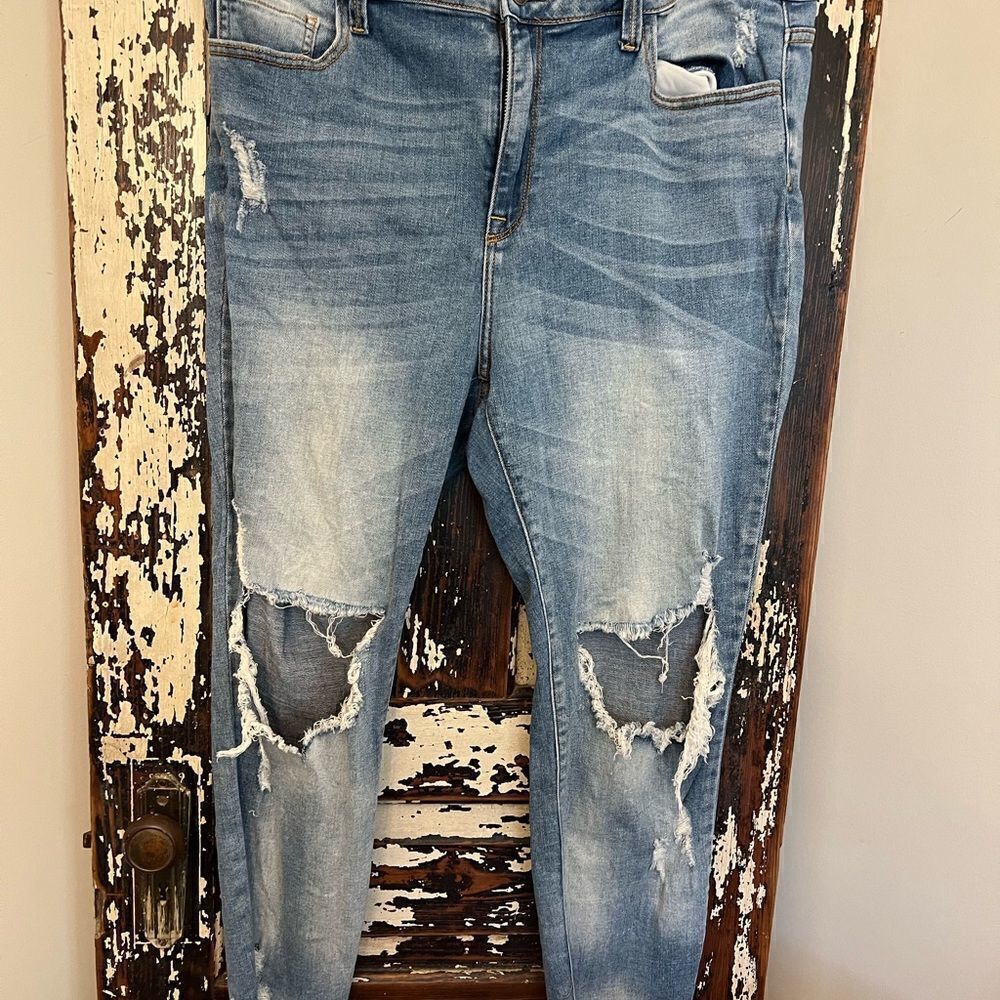 Women’s distressed Ms. Cello size 18 jeans.